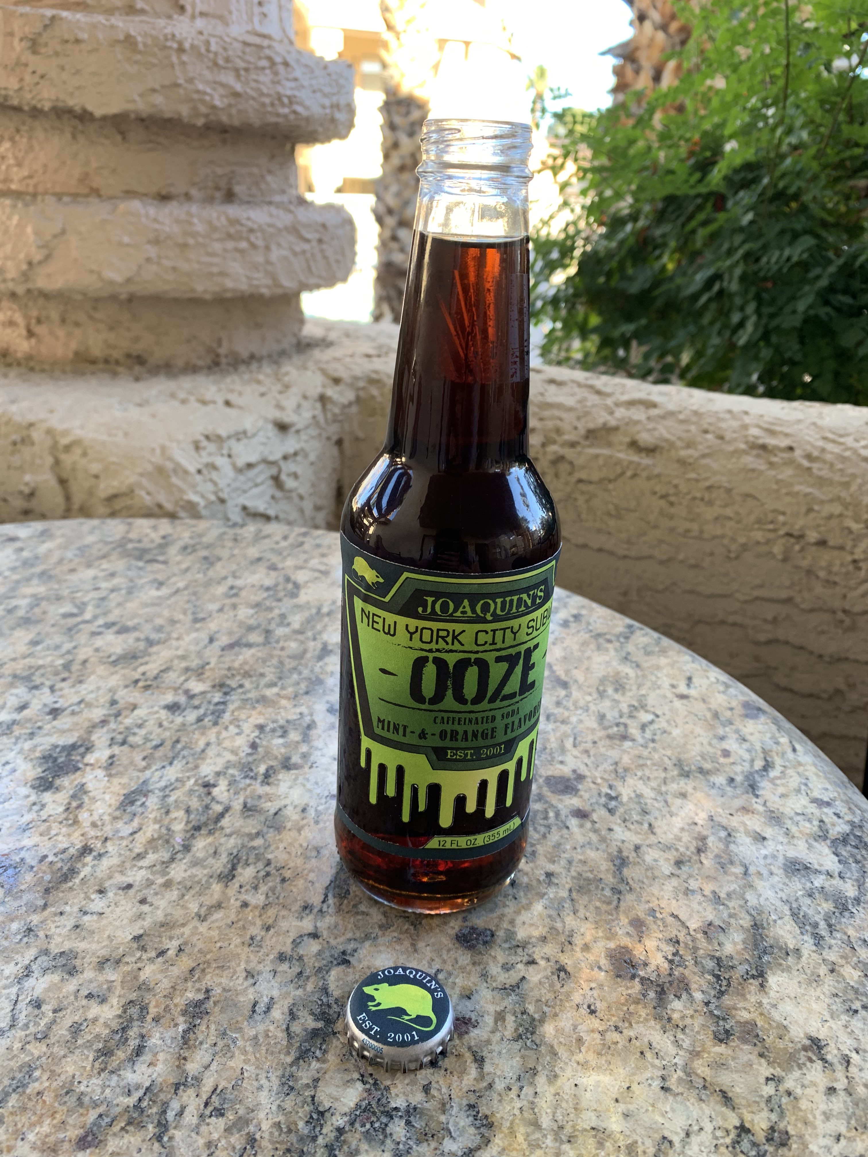 A physical mockup of the label on a real bottle of soda.